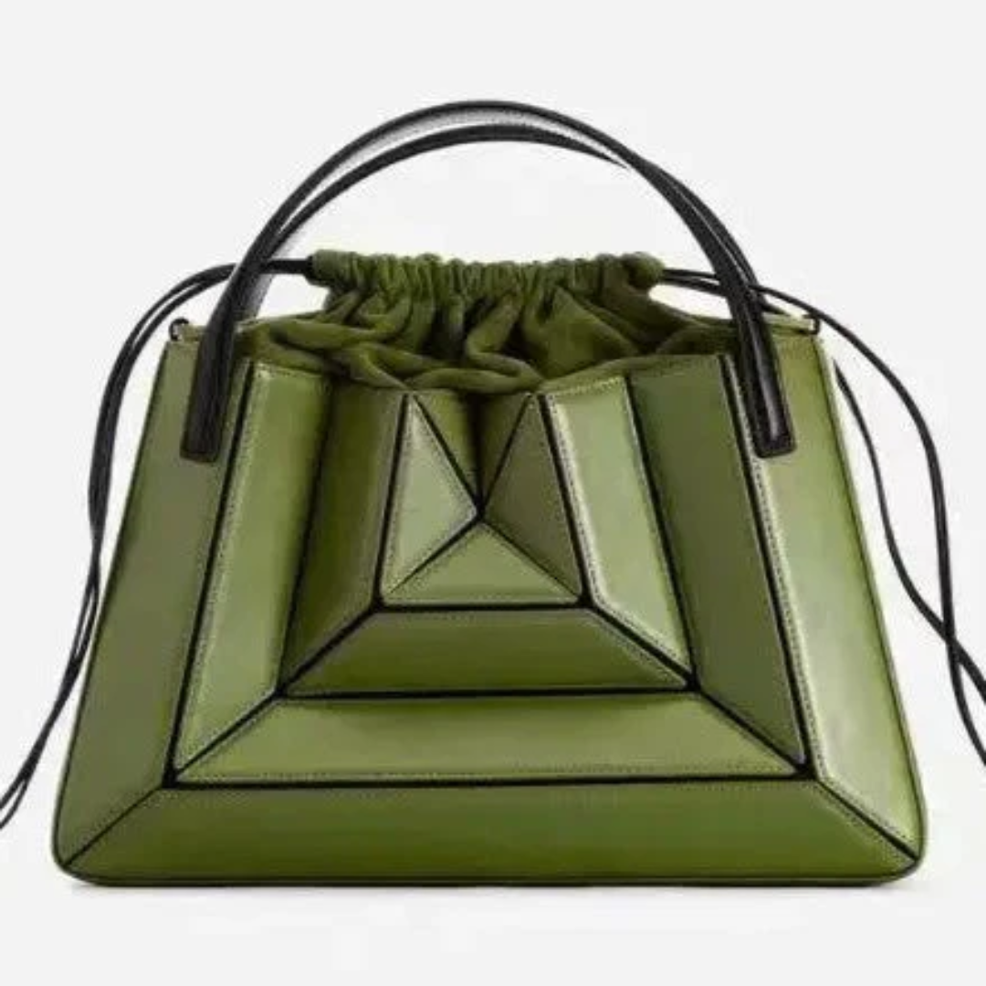 Blauwe moderne dames handtas GeoChic. Ruime schoudertas met opvallend geometrisch patroon, stijlvol en trendy.