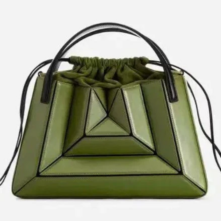 Blauwe moderne dames handtas GeoChic. Ruime schoudertas met opvallend geometrisch patroon, stijlvol en trendy.