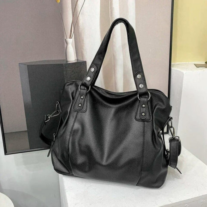 Ruime luxe leren schoudertas dames, ideaal voor werk of vrije tijd, een onmisbaar accessoire.