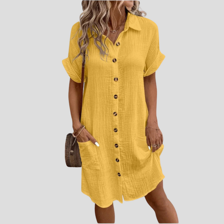 Elegante dames overhemdjurk, comfortabele midi lengte met klassieke kraag, ideaal voor casual gebruik.