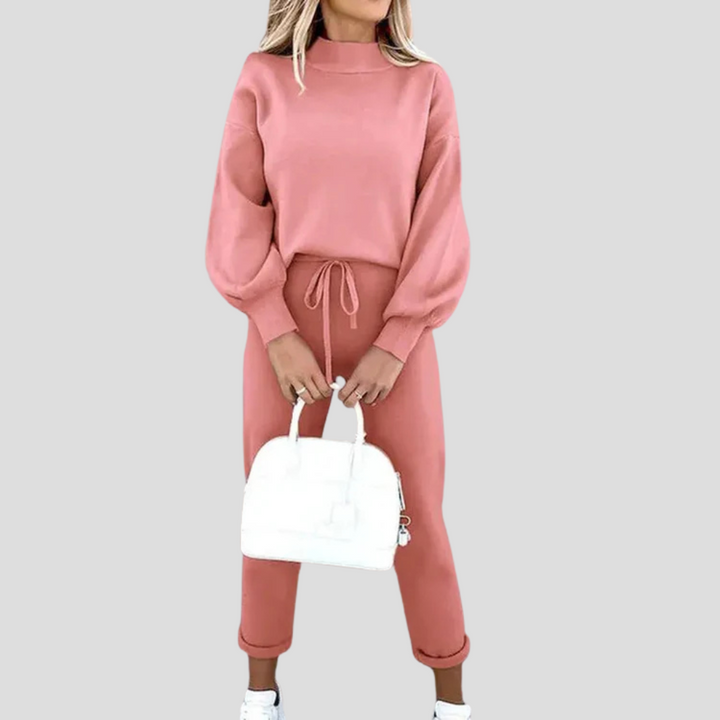 Stijlvol dames relaxed-fit joggingpak, modern design van katoenmix voor vrijetijd en comfort.
