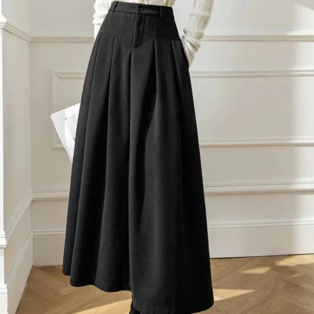 Comfortabele bruine midi kokerrok voor dames, tijdloze mode voor elke gelegenheid. Polyester-viscose mix.