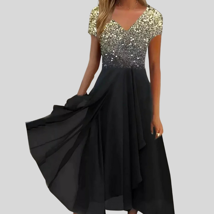 Comfortabele damesjurk met flatterende pasvorm, gemaakt van zachte mixstof. Chique midi lengte voor een elegante look.