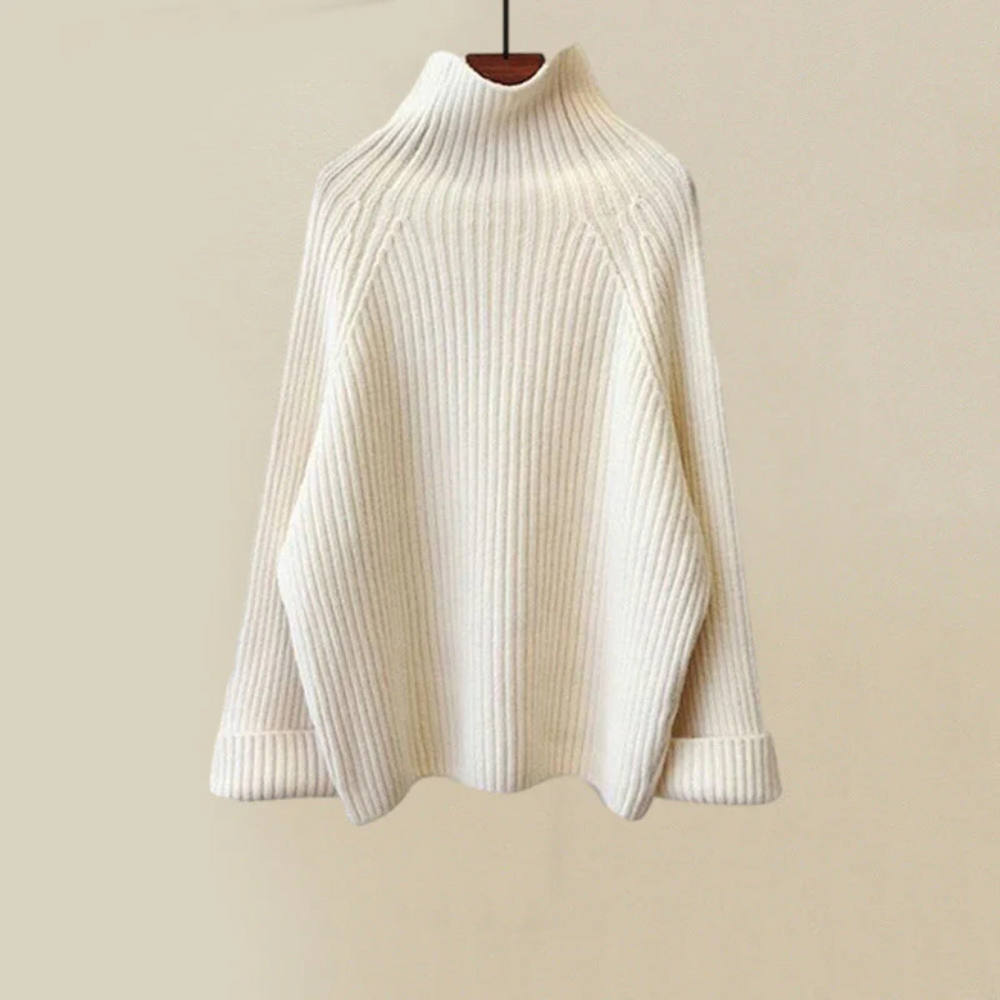 Close-up van de zachte, warme stof van deze comfortabele dames winterset, perfect tegen koud weer.