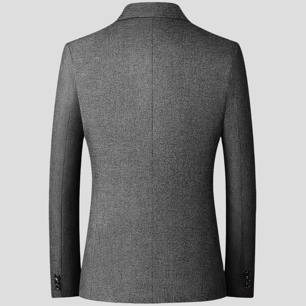 Donkergrijze heren colbert, formeel en toch veelzijdig, geschikt voor zakelijke kleding of vrije tijd.
