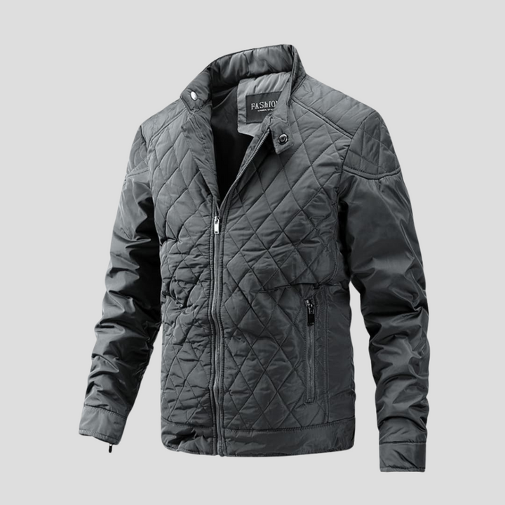 Comfortabele gewatteerde herenjas, waterafstotend. Ideaal als warme winterjas of stijlvolle tussenjas voor mannen.