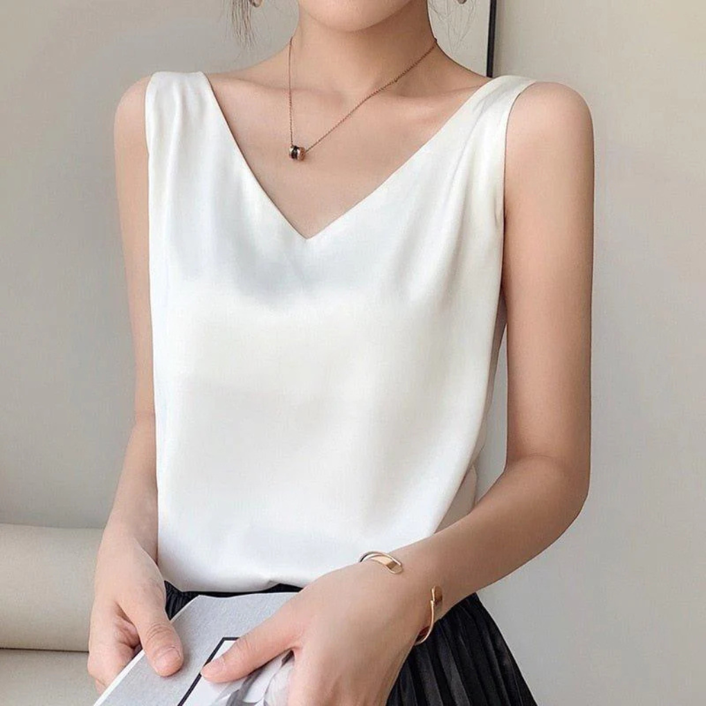 Stijlvolle dames tanktop met fijne bandjes en stretch pasvorm, een basic zomer top, modieus in elke kleur.