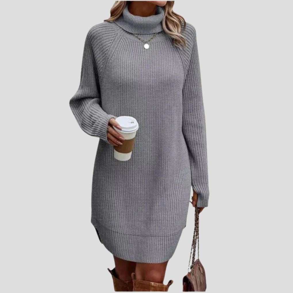 Dames gebreide midi jurk met verfijnde textuur. Elegante pasvorm, ideaal voor een stijlvolle look in de herfst/winter.