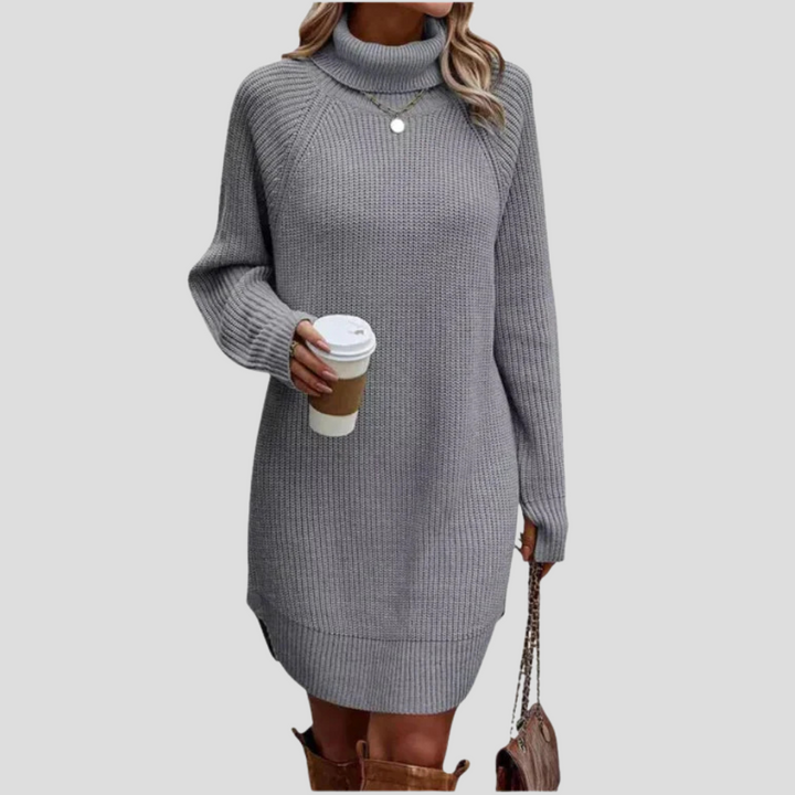 Dames gebreide midi jurk met verfijnde textuur. Elegante pasvorm, ideaal voor een stijlvolle look in de herfst/winter.