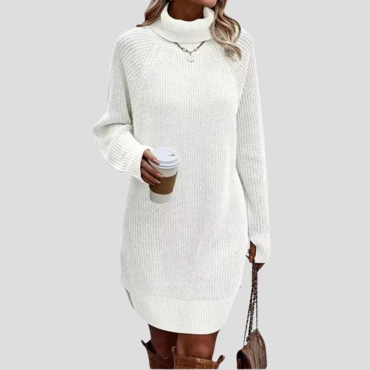 Warme gebreide midi damesjurk, ideaal voor herfst- en wintermode. Comfortabel, elegant en veelzijdig voor elke dag.