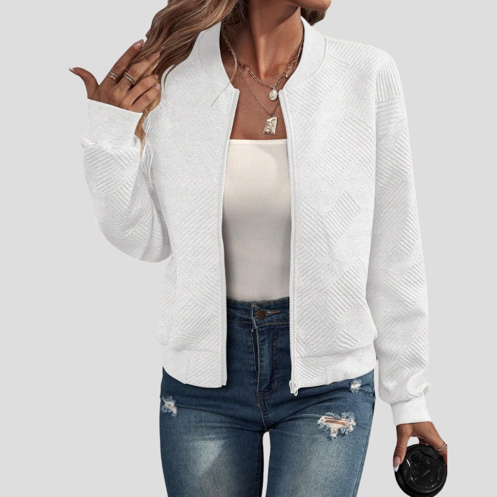 Comfortabel damesvest met lange mouwen in neutrale kleur, gebreid. Open cardigan, ideaal voor een elegante outfit.