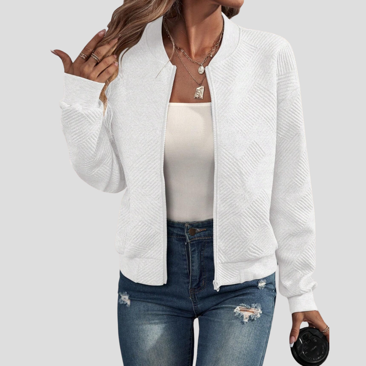 Comfortabel damesvest met lange mouwen in neutrale kleur, gebreid. Open cardigan, ideaal voor een elegante outfit.