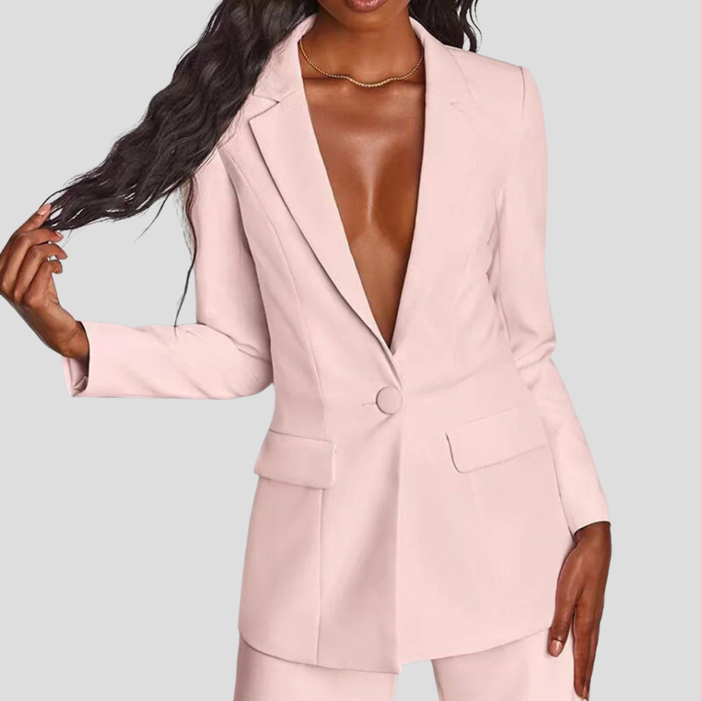Luxe damespak met een klassieke blazer en een moderne, elegante pantalon.