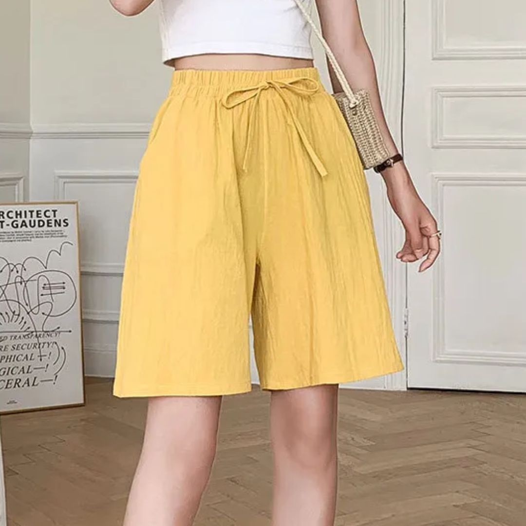 Veelzijdige dames zomershort met hoge taille, casual en comfortabel voor diverse zomeractiviteiten.