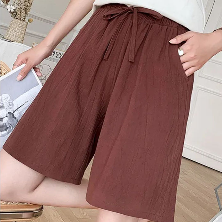 Stijlvolle effen dames shorts met hoge taille, voor een trendy en luchtige zomeroutfit.