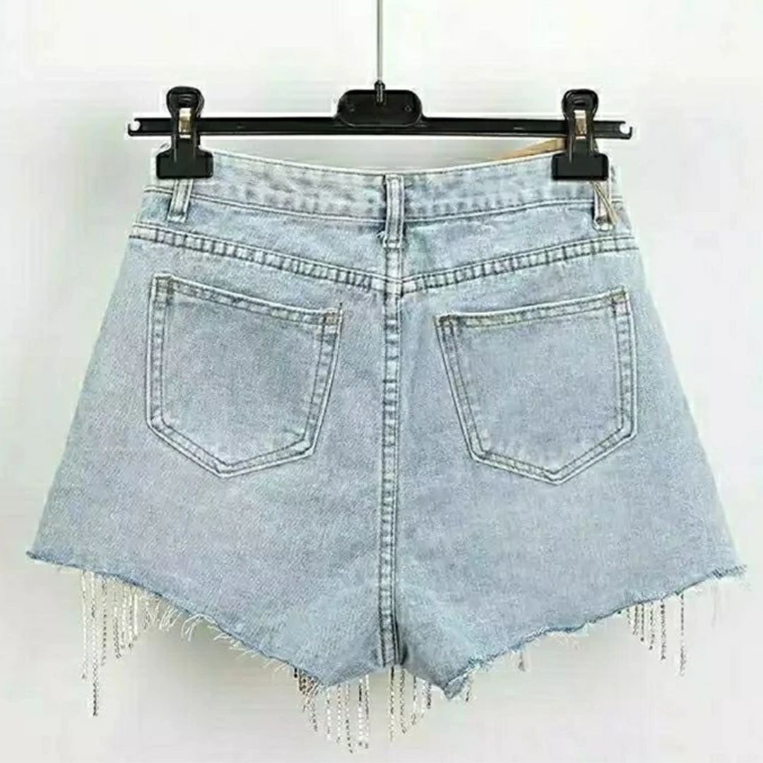 Dames roze korte broek van denim, high-waist model met glamoureuze diamantapplicaties, voor een trendy zomer.