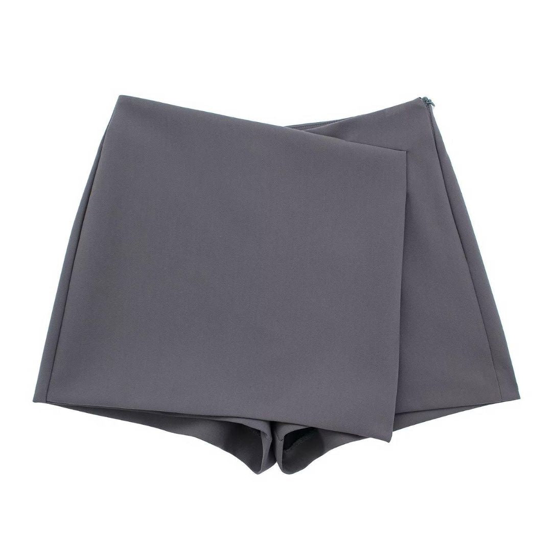 Lente-proof dames rokbroek, modieus en praktisch, met asymmetrische voorkant.
