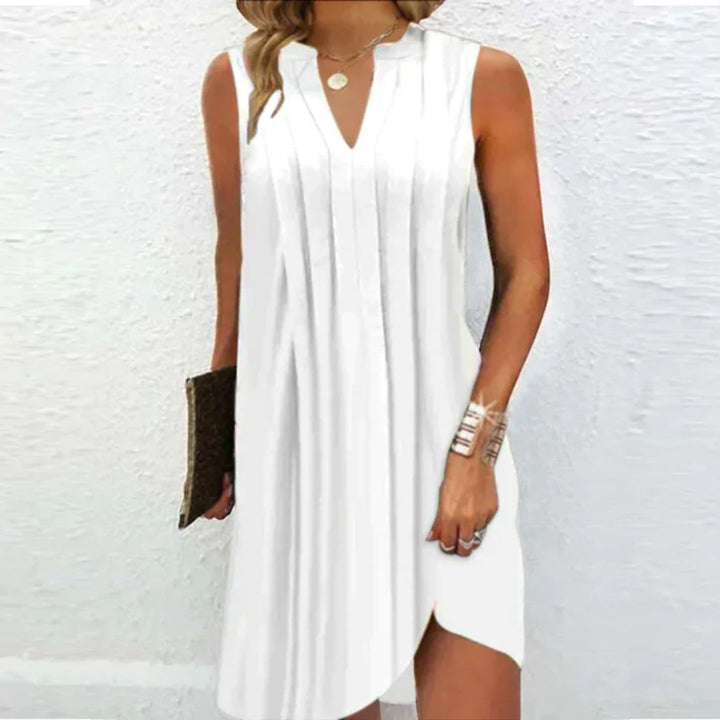 Elegante mouwloze V-hals damesjurk, perfect voor zomerse dagen. Veelzijdig en modieus.