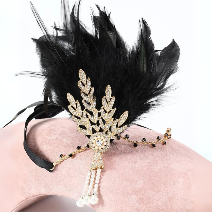 Veren dameshoofdband: perfecte vintage accessoire voor een vleugje jaren 20 glamour.