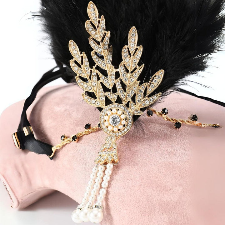 Luxe veren hoofdband dames: vintage glamour accessoire, ideaal voor avondkleding.