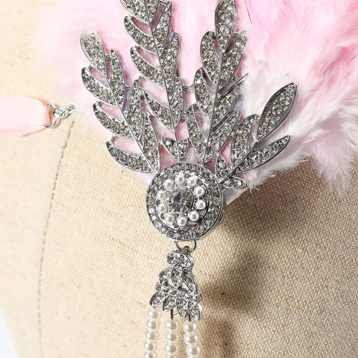 Feestelijke veren haarband voor dames: stijlvol jaren 20 accessoire met vintage allure.