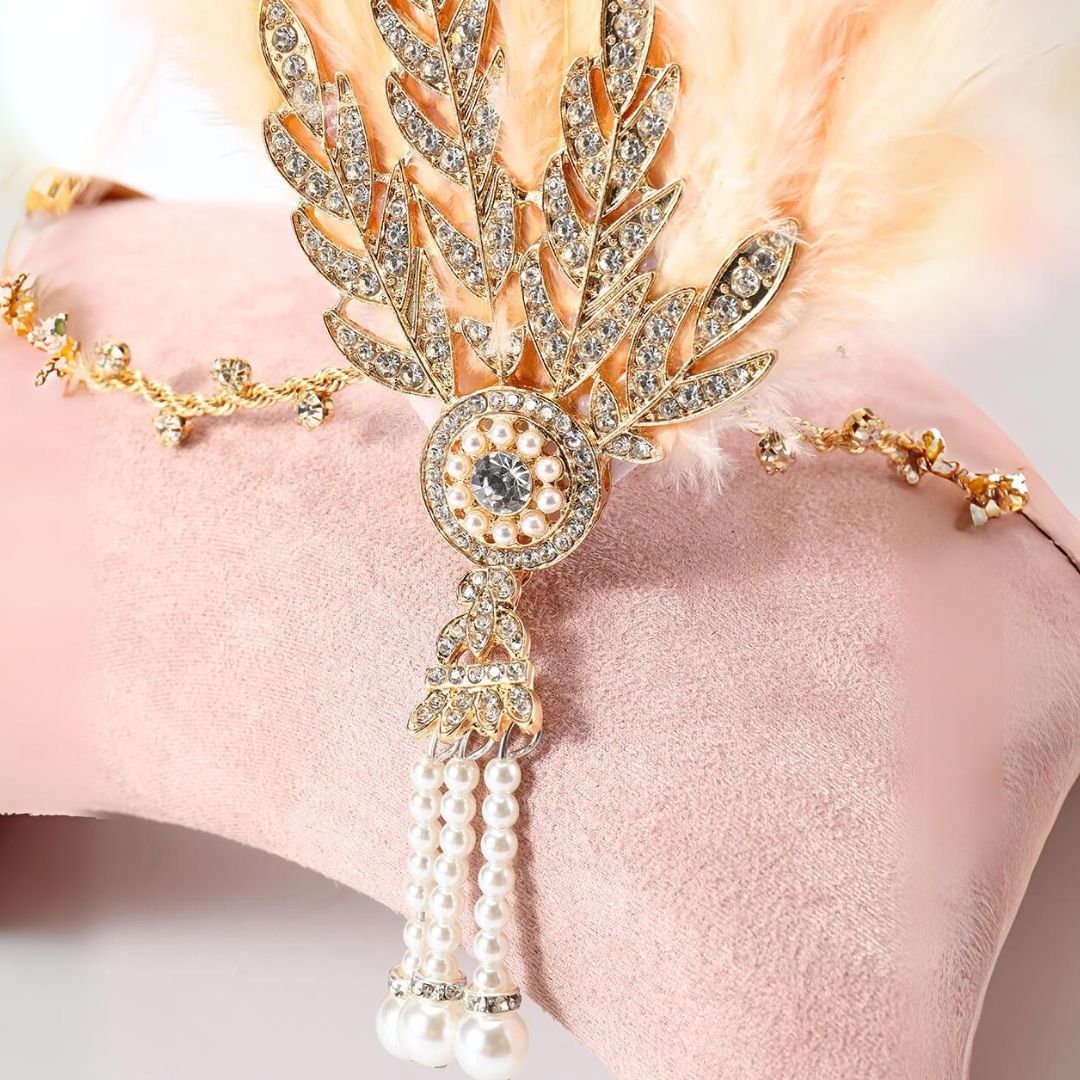 Glamoureuze veren hoofdband dames: elegant haaraccessoire in vintage stijl voor speciale gelegenheden.