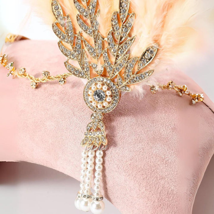 Glamoureuze veren hoofdband dames: elegant haaraccessoire in vintage stijl voor speciale gelegenheden.