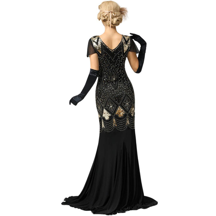 Chique dames feestjurk met een jaren '20 vibe, voorzien van glimmende pailletten en elegante franjes voor pure glamour.