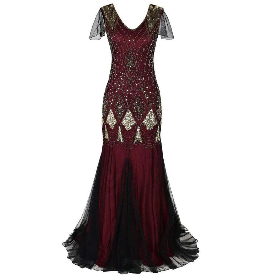 Opvallende flapper jurk voor dames met dynamische franjes en schitterende pailletten, ideaal voor een vintage dansfeest.