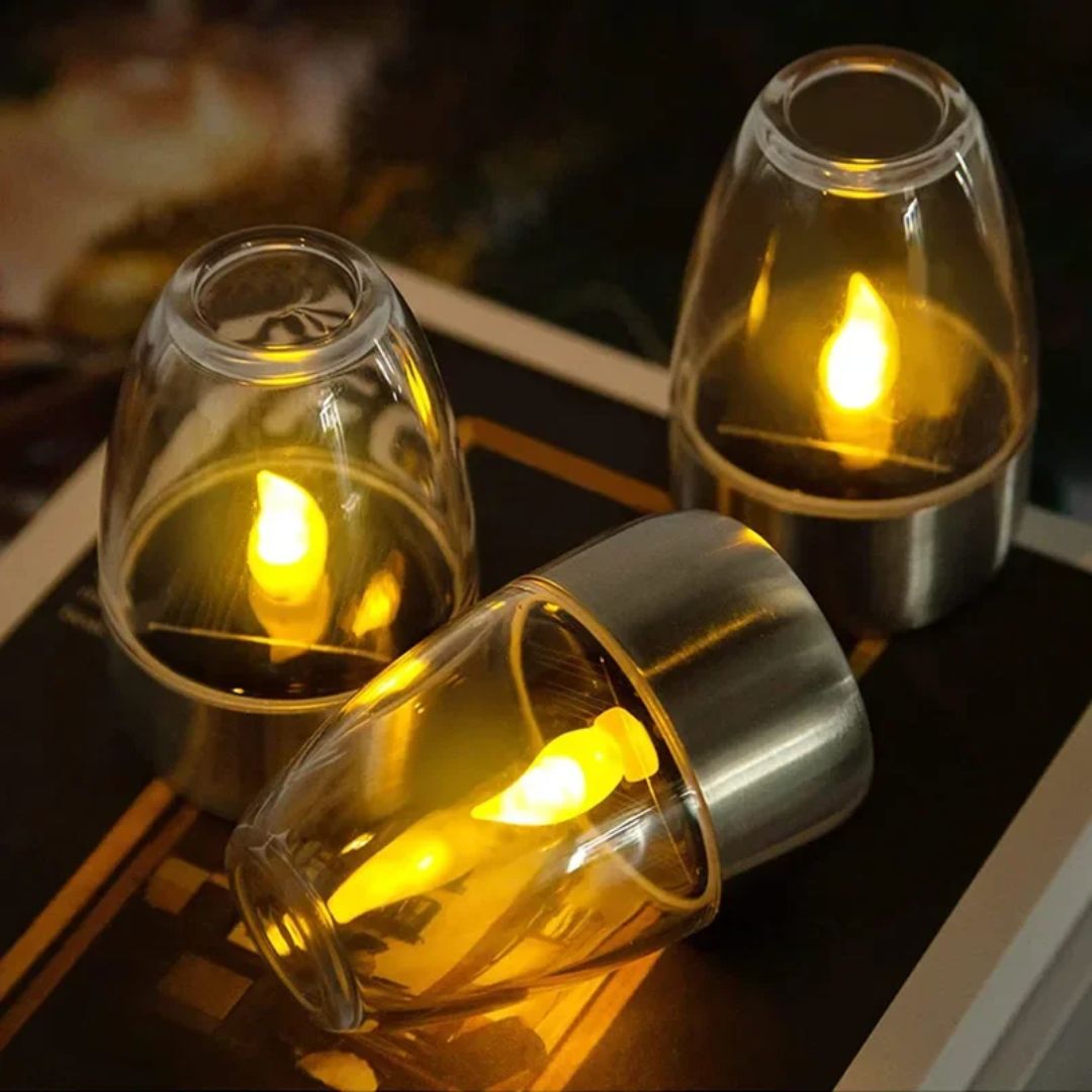 Betoverend zonne-LED kaarslicht voor tuin, creëert warme sfeerverlichting op terras. Waterdichte buitenlamp.