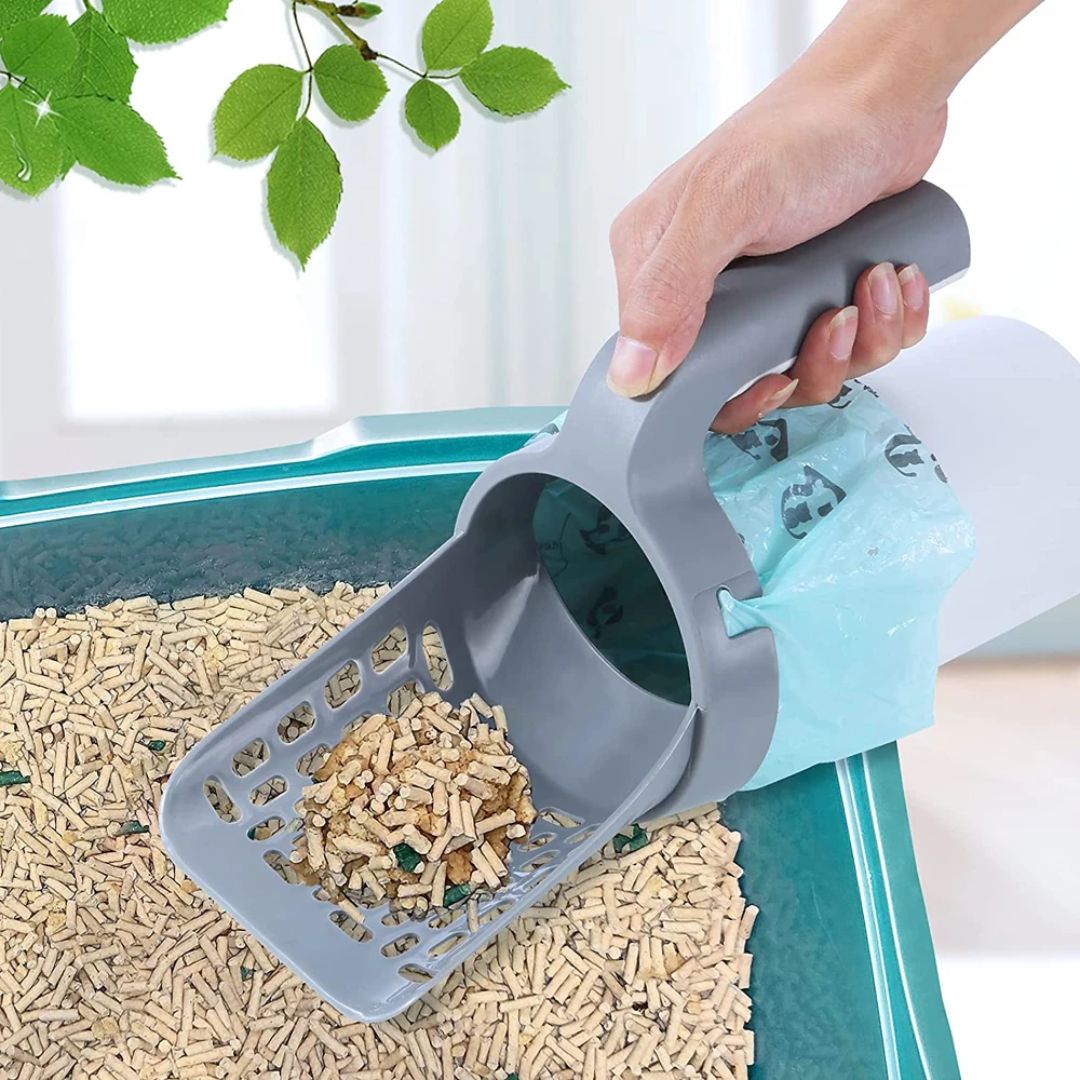 Hygiënische kattenbak schep met zeef en geïntegreerde afvalbak voor snelle reiniging van kattenbakvulling.