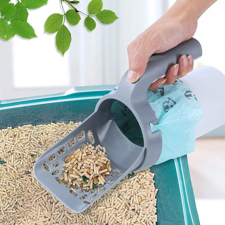 Hygiënische kattenbak schep met zeef en geïntegreerde afvalbak voor snelle reiniging van kattenbakvulling.