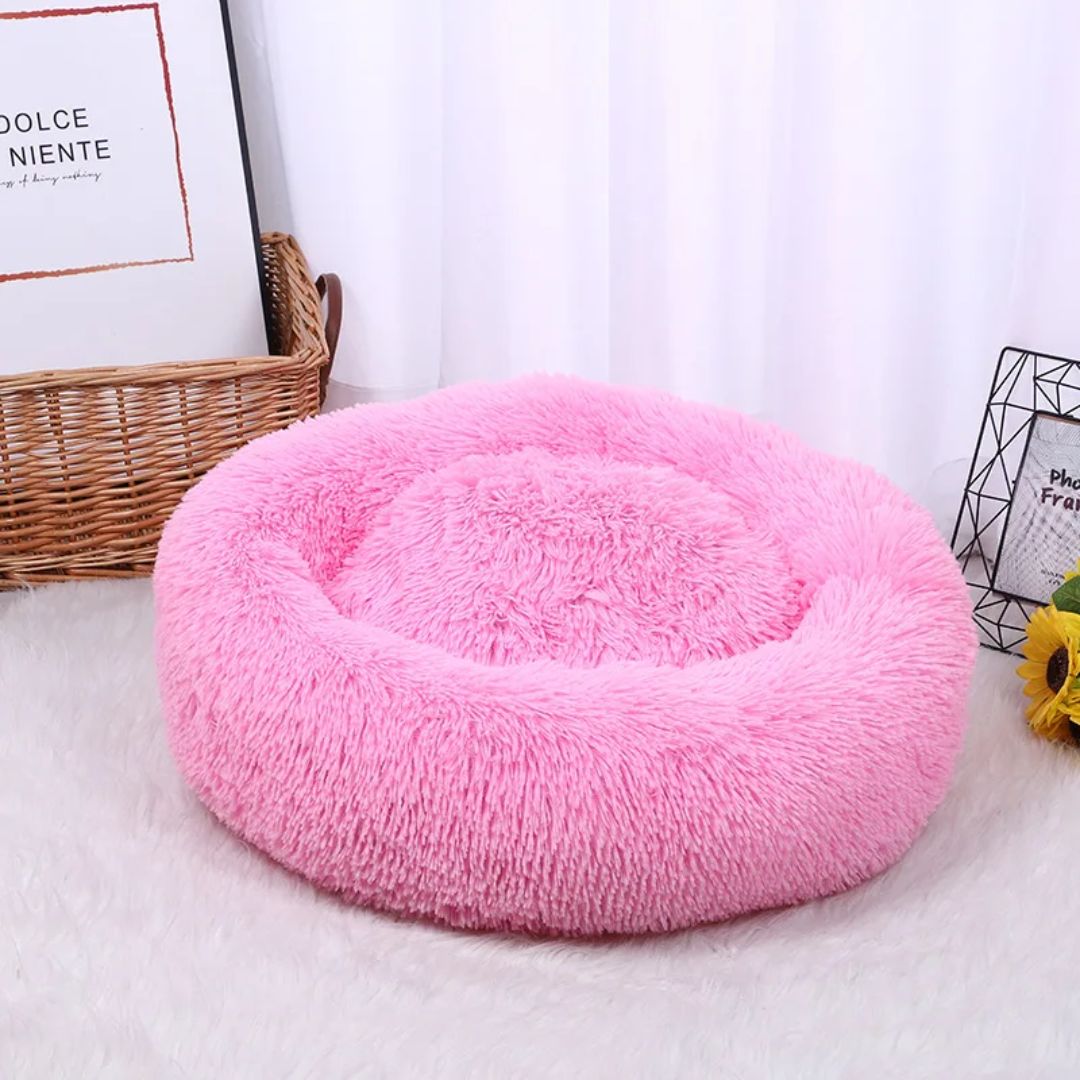 Warm pluchen donutbed; ideaal knuffelbed voor honden en katten, comfort en geborgenheid.