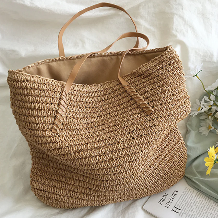 Dames TerraWoven handtas met stevige schouderband, ruim en geweven bruin-wit. Elegant en functioneel.