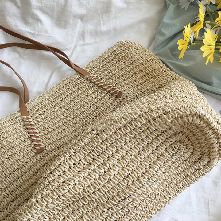 Stevige schouderband van de TerraWoven dames handtas, geweven bruin-wit. Optimaal draagcomfort.