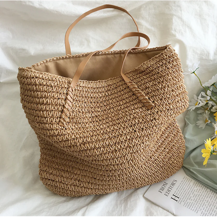 Binnenzijde ruime TerraWoven dames handtas, bruin-wit geweven. Praktische indeling voor al je essentials.