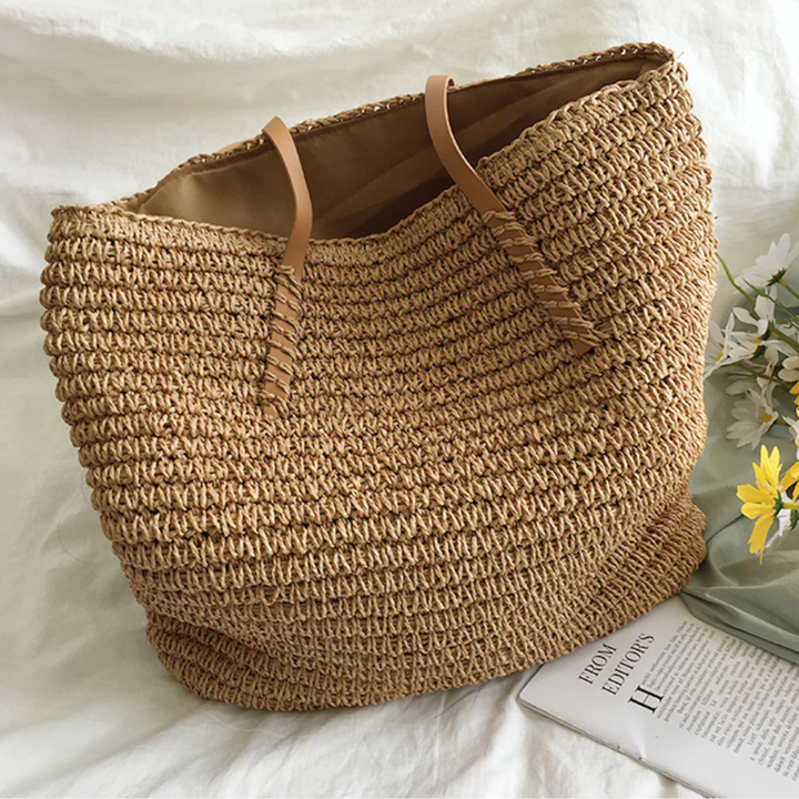 Dames TerraWoven handtas, geweven bruin-wit met ruim interieur. Praktische schoudertas voor dagelijks gebruik.