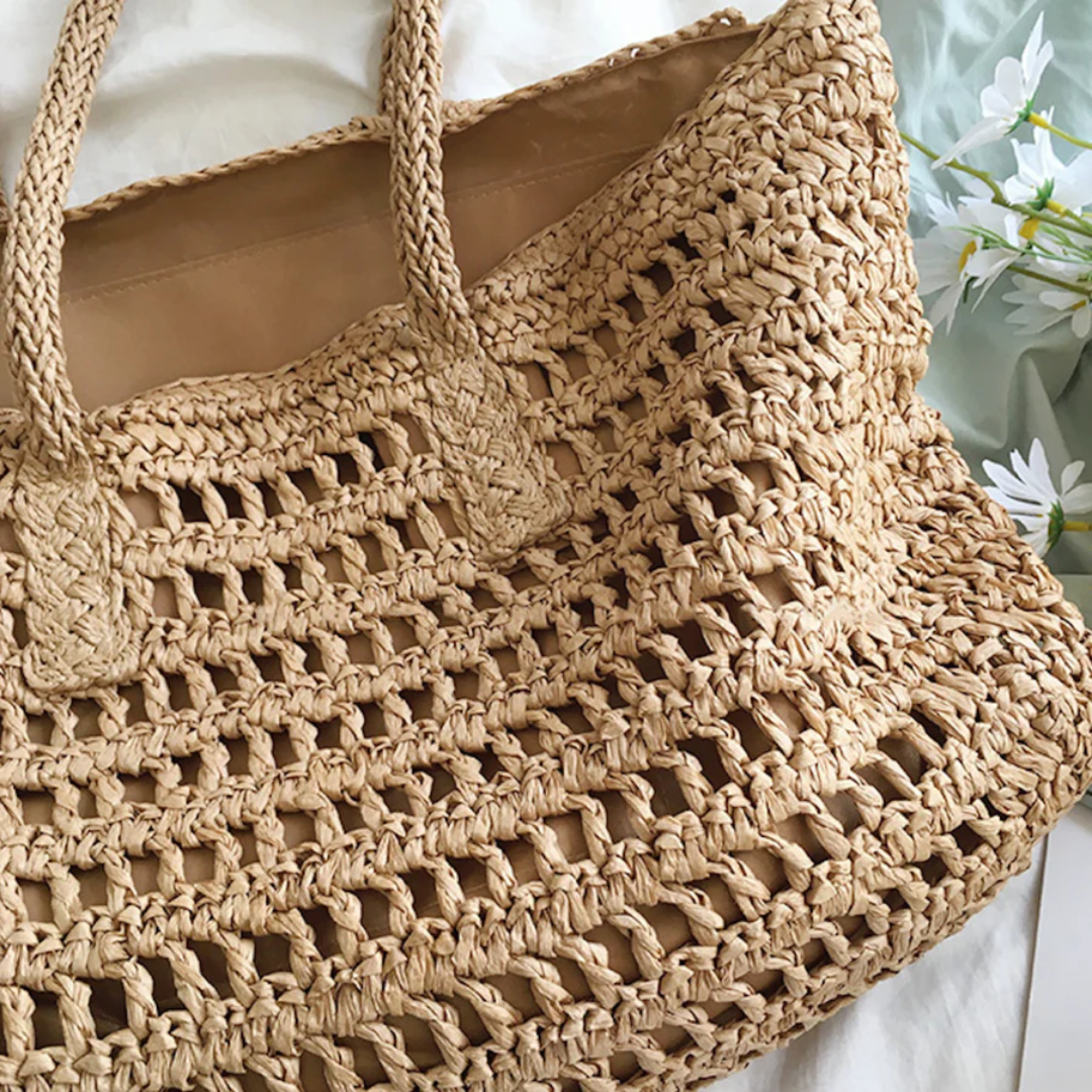 Detail van de geweven textuur van de BreezeTote dames strandtas, benadrukt kwaliteit en stijl.