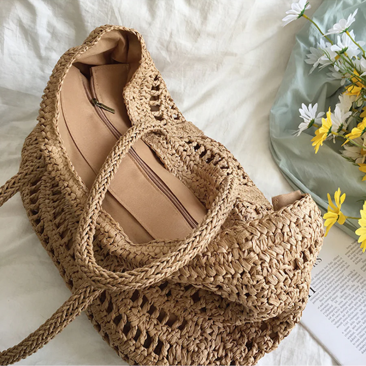 Zomerse geweven handtas voor dames, ruime strandtas met stijlvol design, perfect voor vakantie.