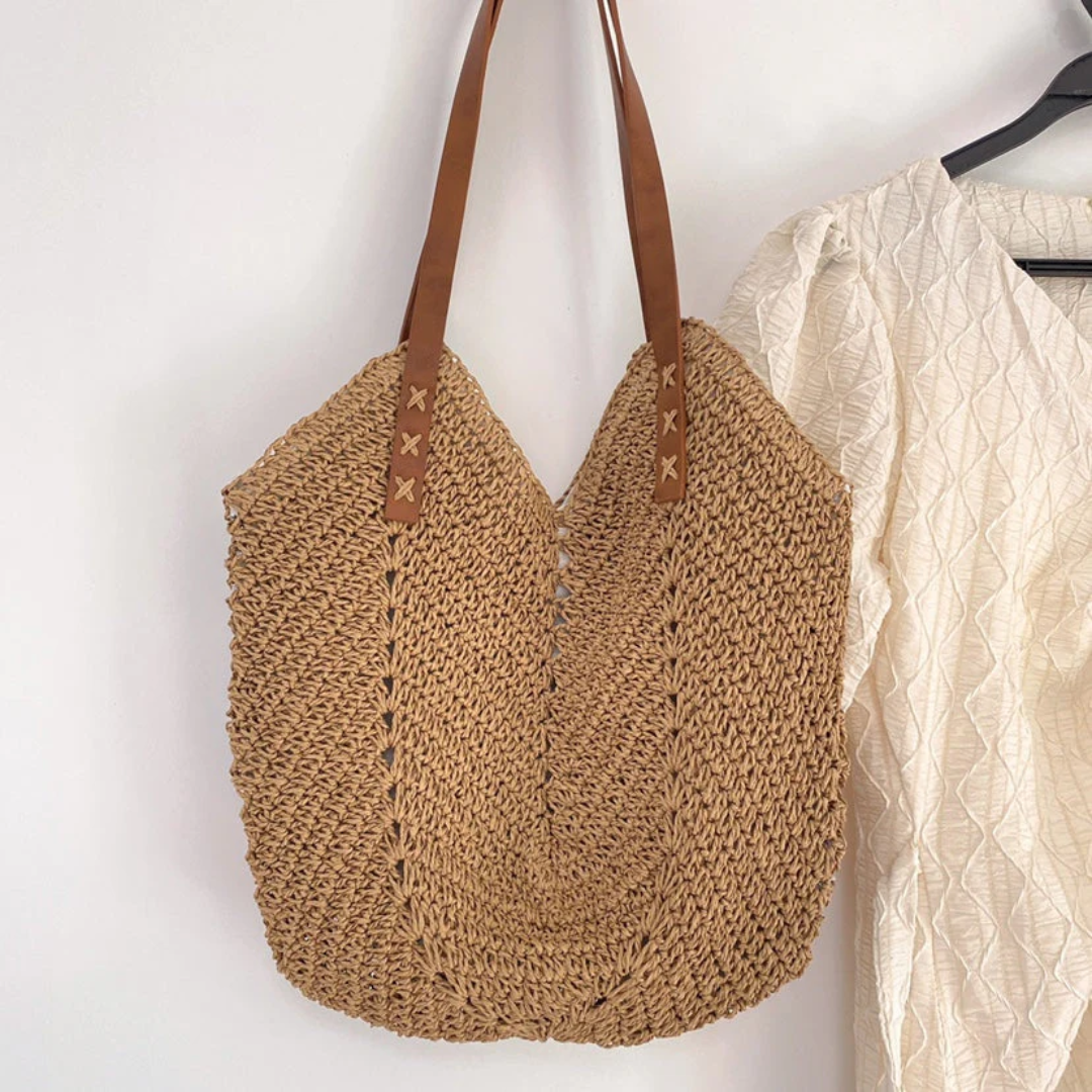 Dames schoudertas BreezeWoven in trendy geweven design. Ruime tas voor dagelijks gebruik, stijlvol en modieus.