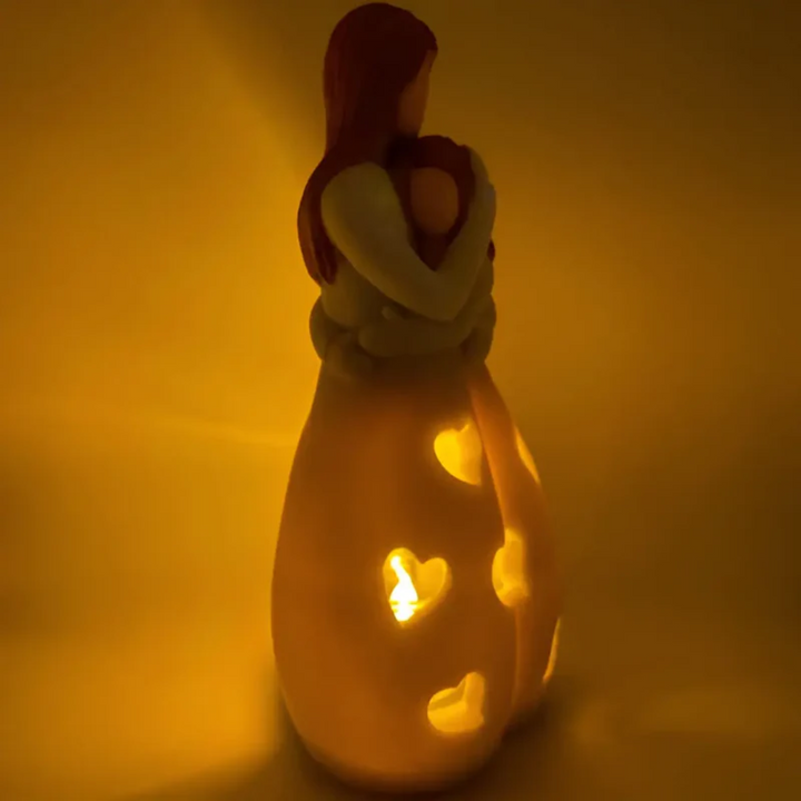 Hartverwarmende kaarshouder die de diepe, liefdevolle band tussen moeder en dochter viert, perfecte decoratie.