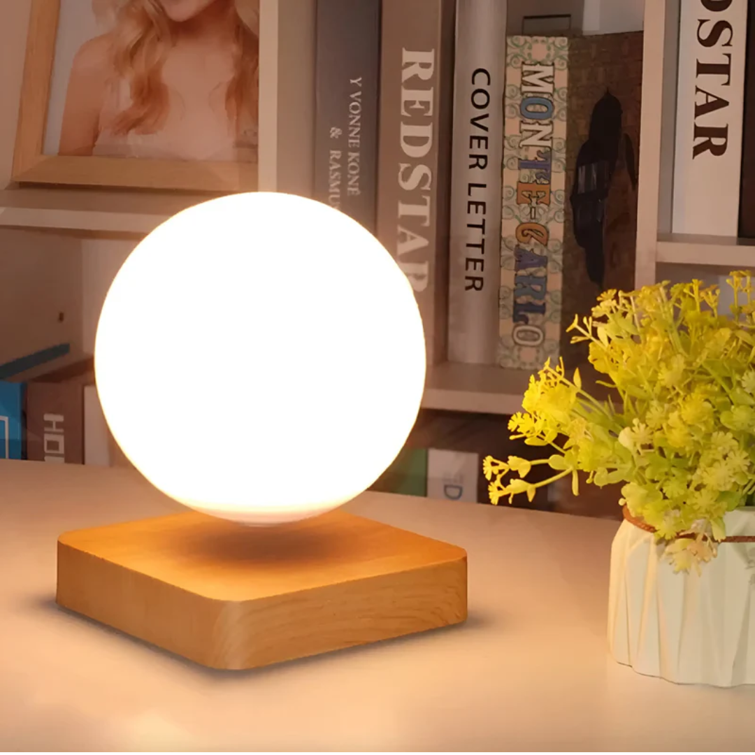 Futuristische drijvende maanlamp LumoRise met inductie en touchbediening. Unieke decoratie en ontspannende sfeerverlichting.