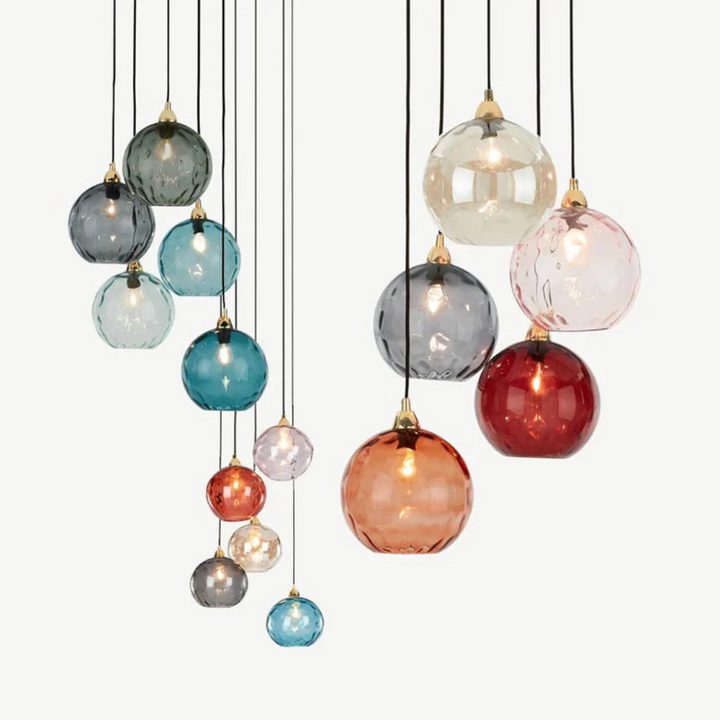 Moderne verlichting voor eettafel: cluster hanglamp met 3 verstelbare kappen.