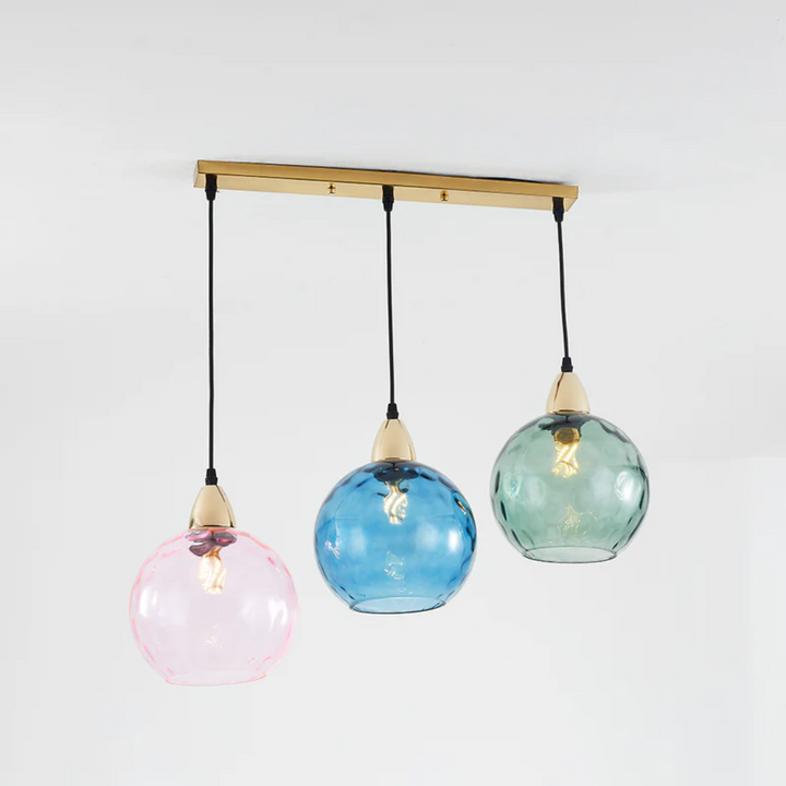 Stijlvolle moderne verlichting: 3-kaps hanglamp met cascade design voor eettafel.