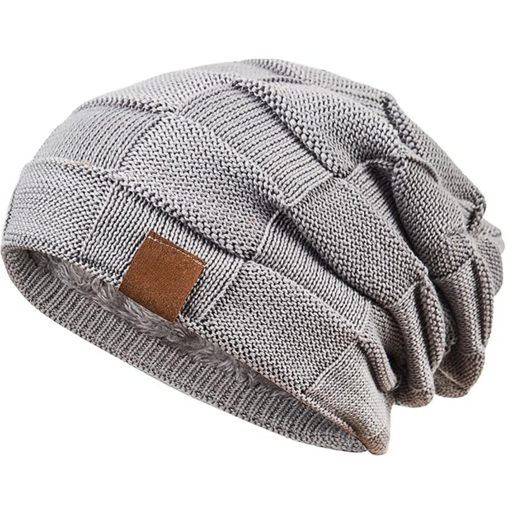 Trendy gebreide beanie, perfect accessoire voor winterkleding. Stijlvol en warm voor dames en heren.
