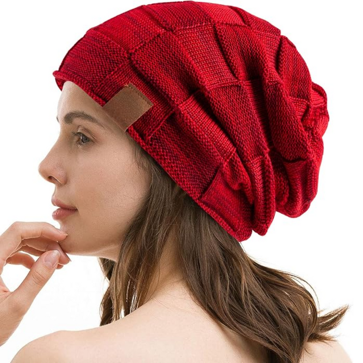 Warme gebreide unisex beanie muts voor winter. Comfortabel en stijlvol hoofddeksel voor dames en heren.