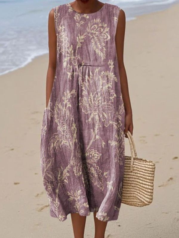 Zwierige geprinte dames zomerjurk, mouwloos en midi lengte, perfect voor een modieuze look.