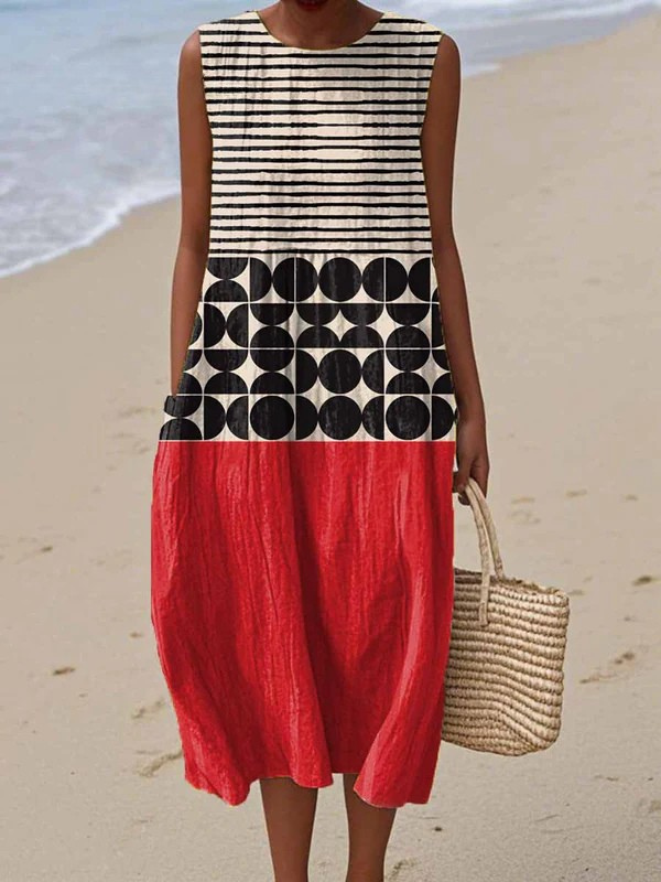 Elegante dames midi jurk zonder mouwen met unieke print, ideaal als zomerjurk of strandjurk.