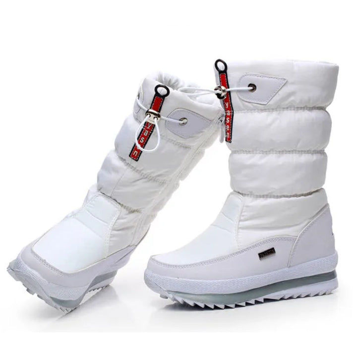 Veelzijdige dames snowboots die warmte en bescherming bieden tegen sneeuw en kou. Waterdicht en antislip.