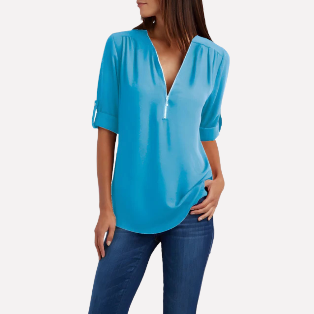 Stijlvolle damesblouse met praktische halve rits in tijdloos design, perfecte pasvorm.